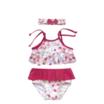 Conjunto de baño Top Sombrilla para niña, con estampado floral y detalles en fucsia.