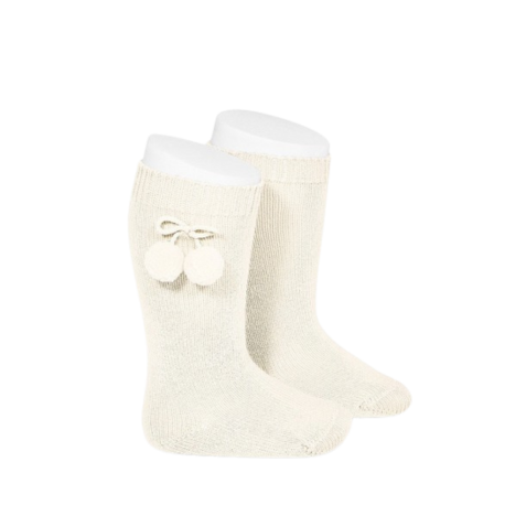 Calcetines altos con borlas Cóndor, suaves y elegantes para niñas.