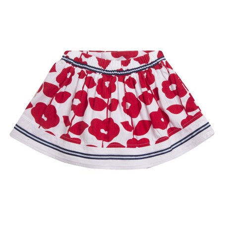 Falda estampada con flores rojas grandes y detalles de rayas navy.