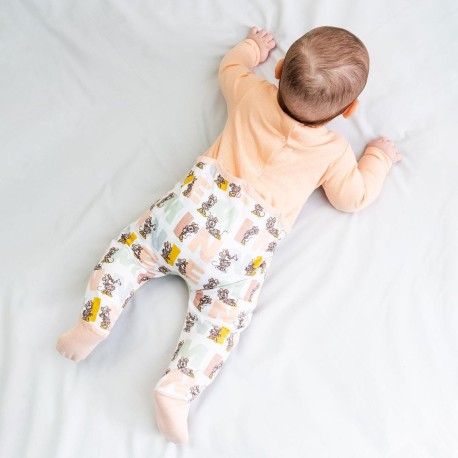 Pelele manga larga Minnie con diseño de Minnie Mouse y estampado colorido, de Disney Baby.